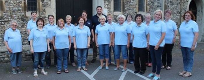 Here we are in our choir t-shirts, taken over 3 years ago, so you can see how many choir members we used to have.
